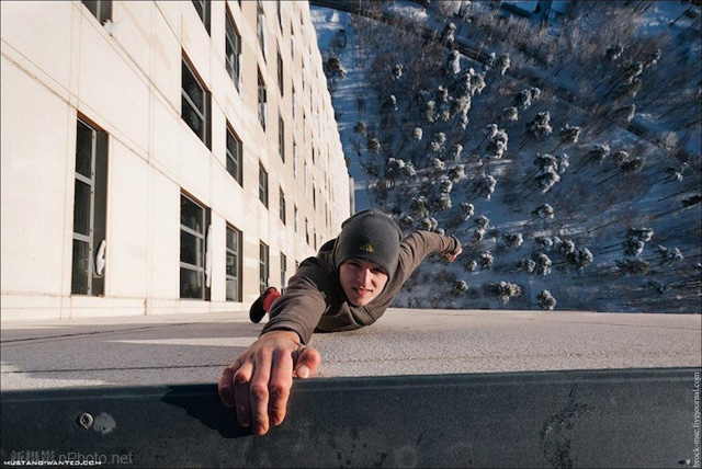 作品赏析：俄罗斯男孩悬挂在高层建筑上拍照10