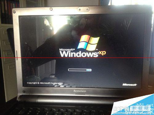 联想天逸f30用ghost安装XP停在Windows开机画面怎么办？1