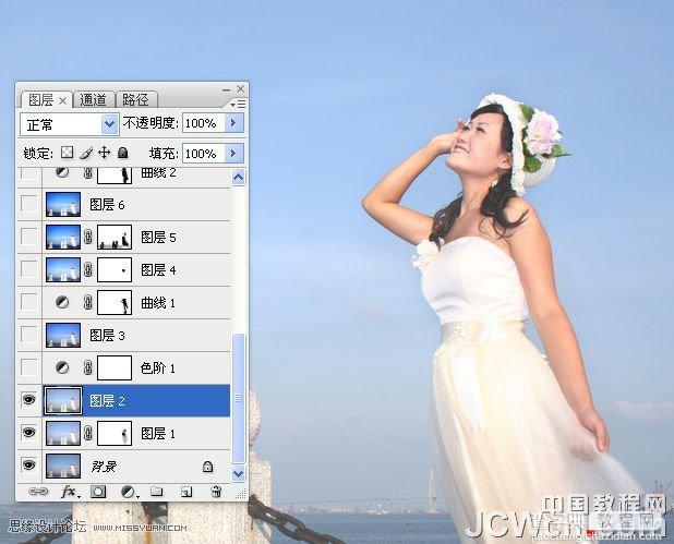 Photoshop调出海景人物图片纯美的蓝色调5