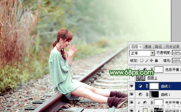 Photoshop为坐在铁轨的美女加上甜美的淡调粉绿色34