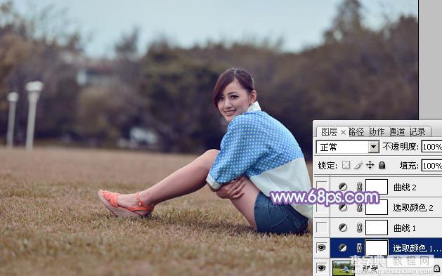 Photoshop为偏暗的草地美女图片加上柔美的浅蓝色调8