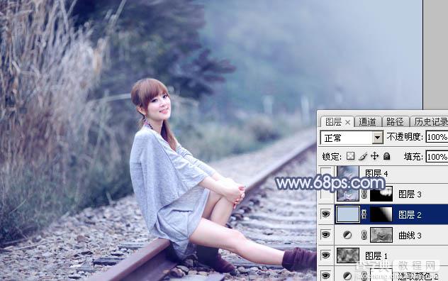 Photoshop为铁轨上的美女加上梦幻甜美的蓝色效果22