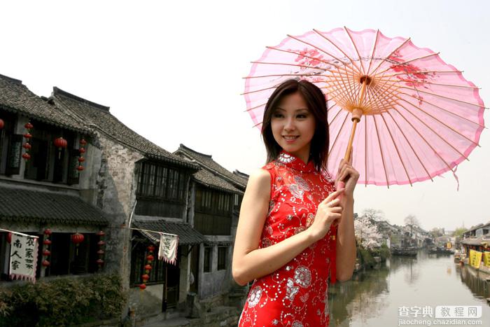 Photoshop调出古典霞光效果古镇美女图片1