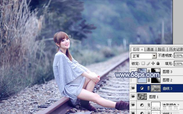 Photoshop为铁轨上的美女加上梦幻甜美的蓝色效果21