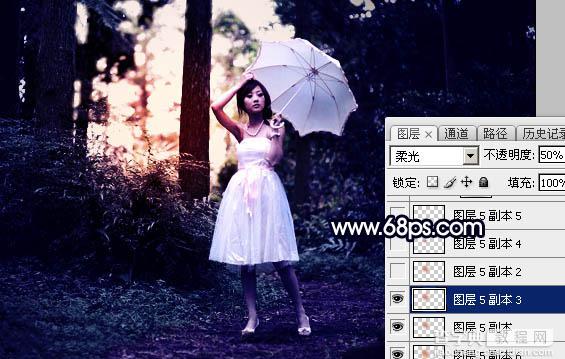Photoshop调制出霞光中的树林人物图片35