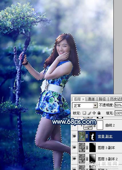 Photoshop调制出梦幻的暗调蓝青色树林人物图片23
